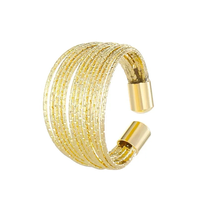 Elevate your everyday look with this modern minimalist ring featuring elegant multi-layer line detailing. Crafted in a sleek silver finish, this versatile piece adds a touch of sophistication to any outfit.