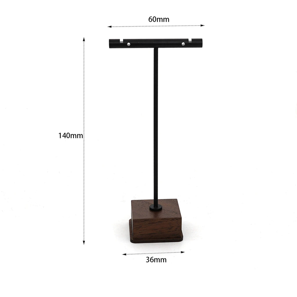 Bring timeless elegance to your space with this Minimalist T-Bar Jewelry Stand, crafted from rich walnut wood and sleek metal. Designed for both style and function, it keeps your favorite earrings, necklaces, and accessories.