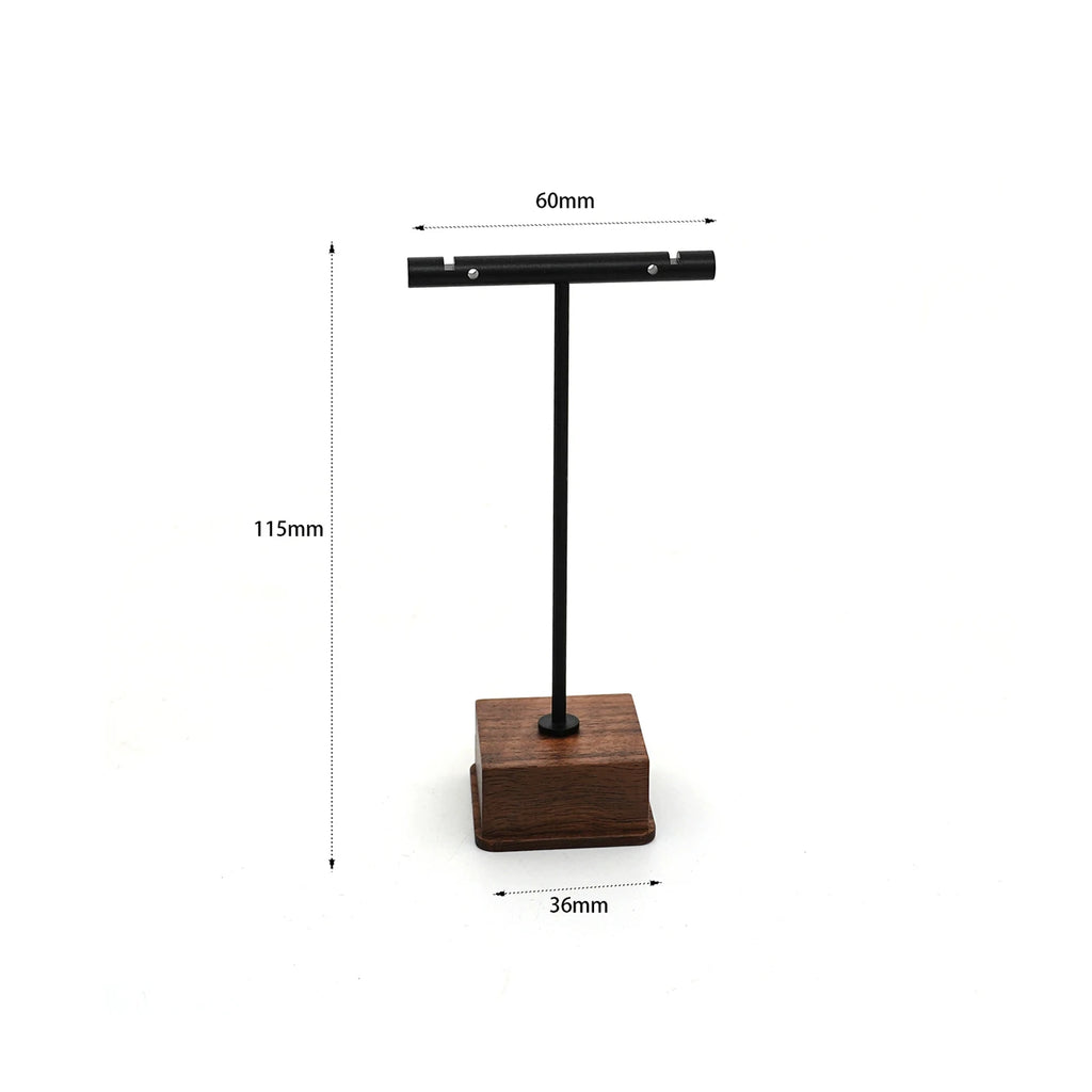 Bring timeless elegance to your space with this Minimalist T-Bar Jewelry Stand, crafted from rich walnut wood and sleek metal. Designed for both style and function, it keeps your favorite earrings, necklaces, and accessories.